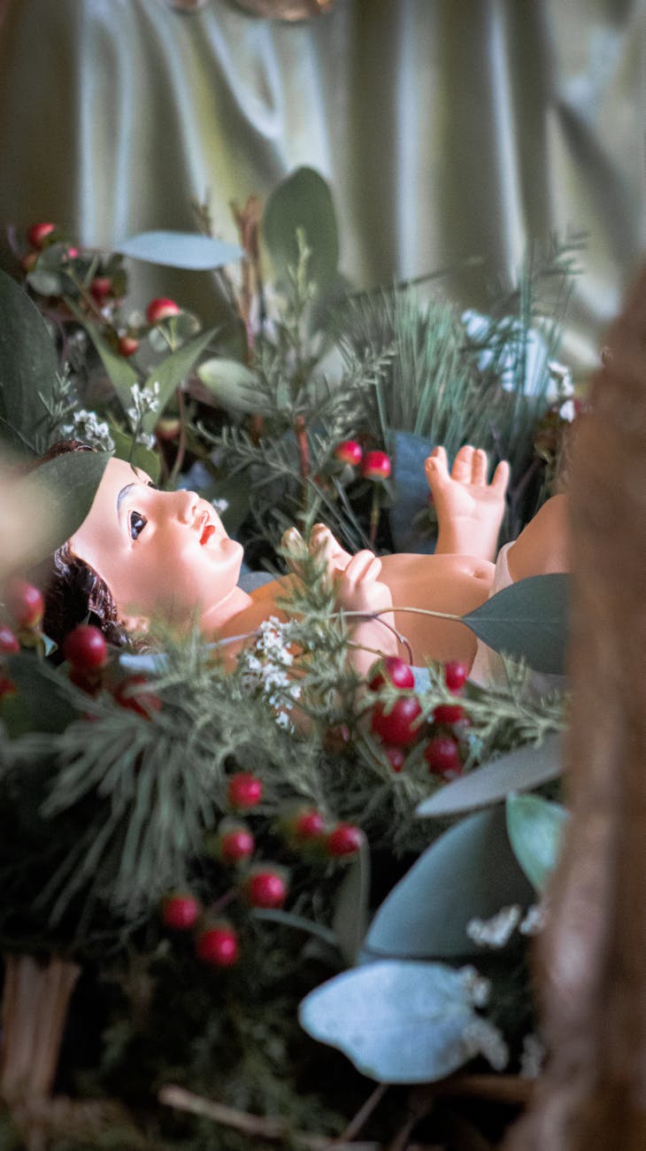 figurine of baby jesus and christmas decoration