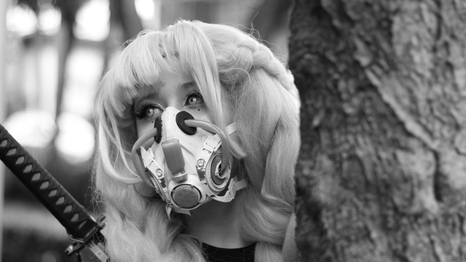 artistic black and white cosplay portrait with mask