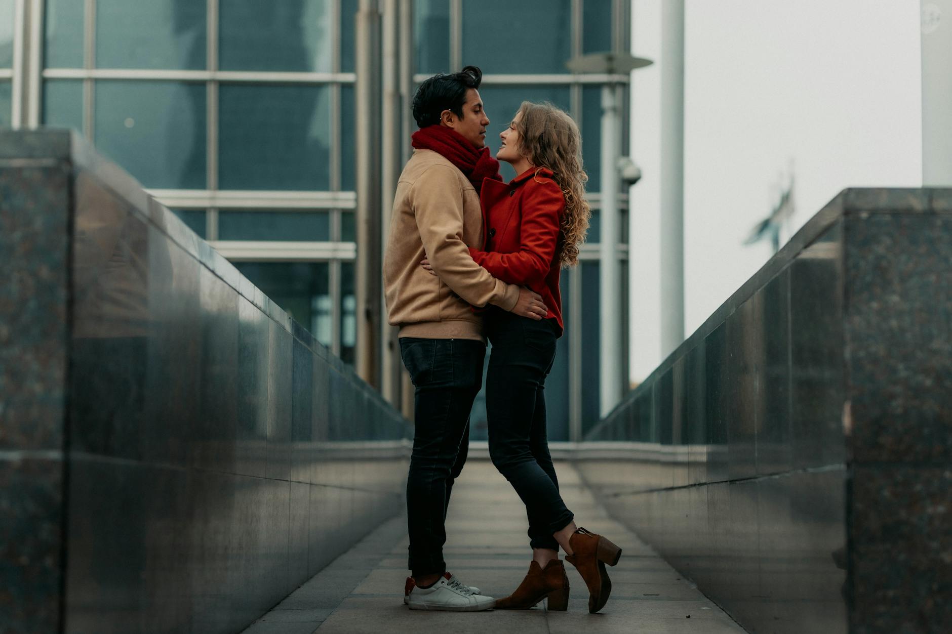 romantic couple embracing in urban setting