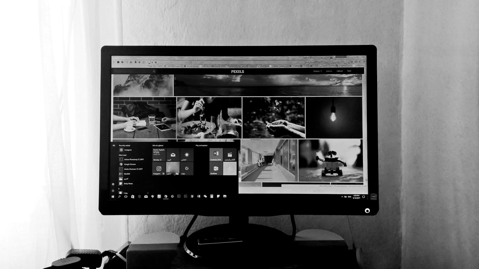 grayscale photo of computer desktop