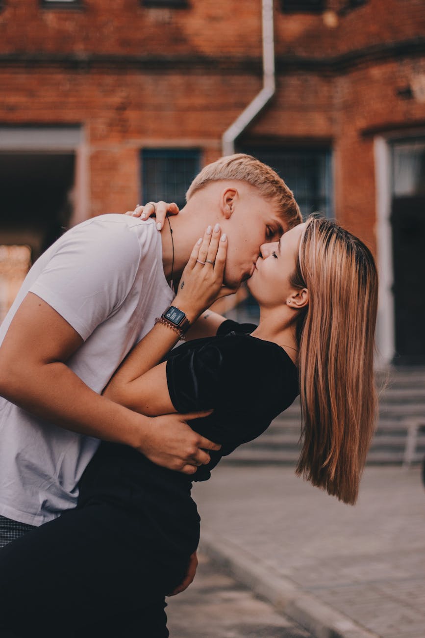 young couple hugging and kissing outside, Christian Dating and Relationships