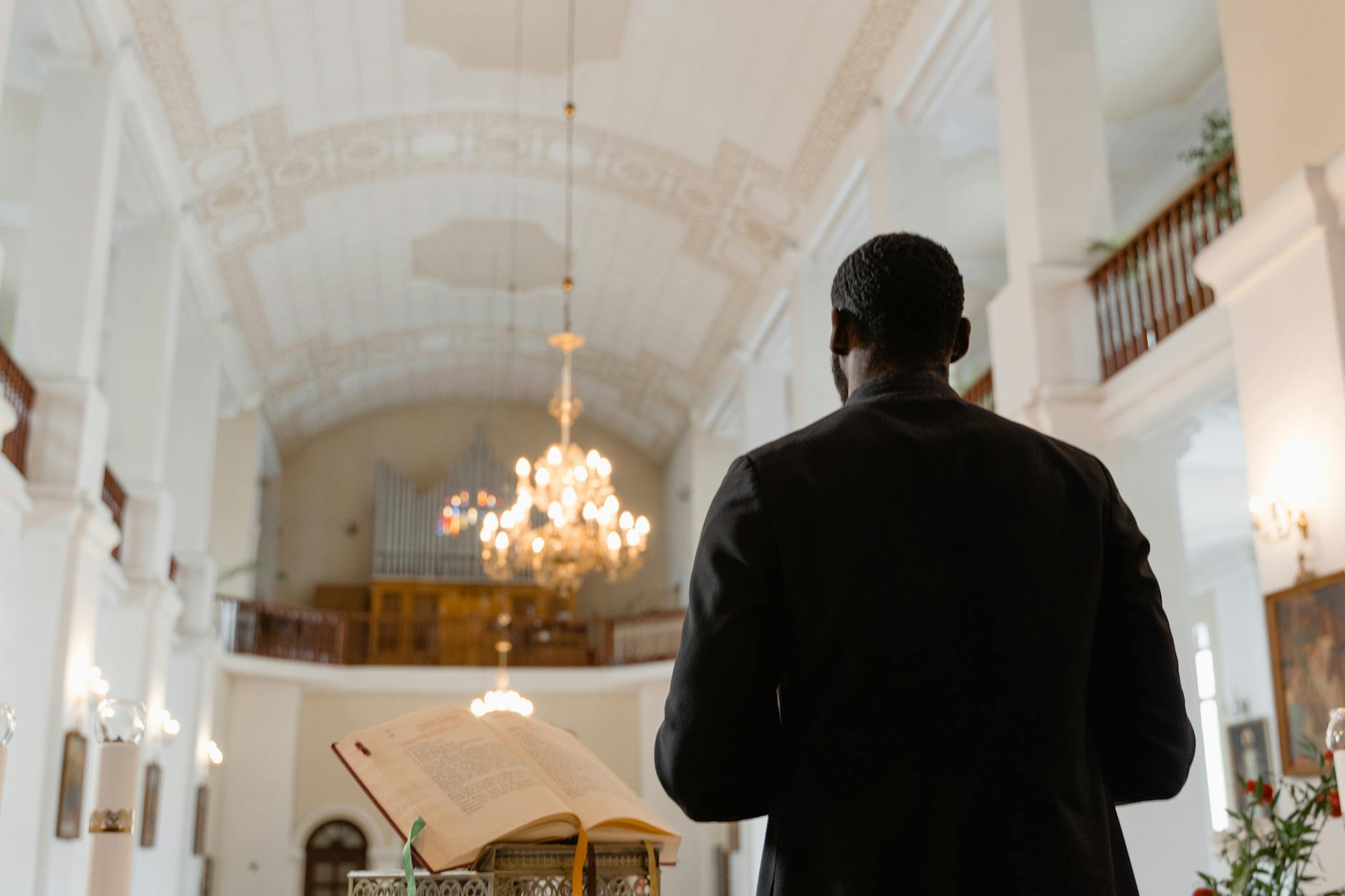 back view of a man inside the church
