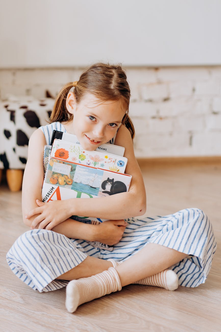a girl hugging books