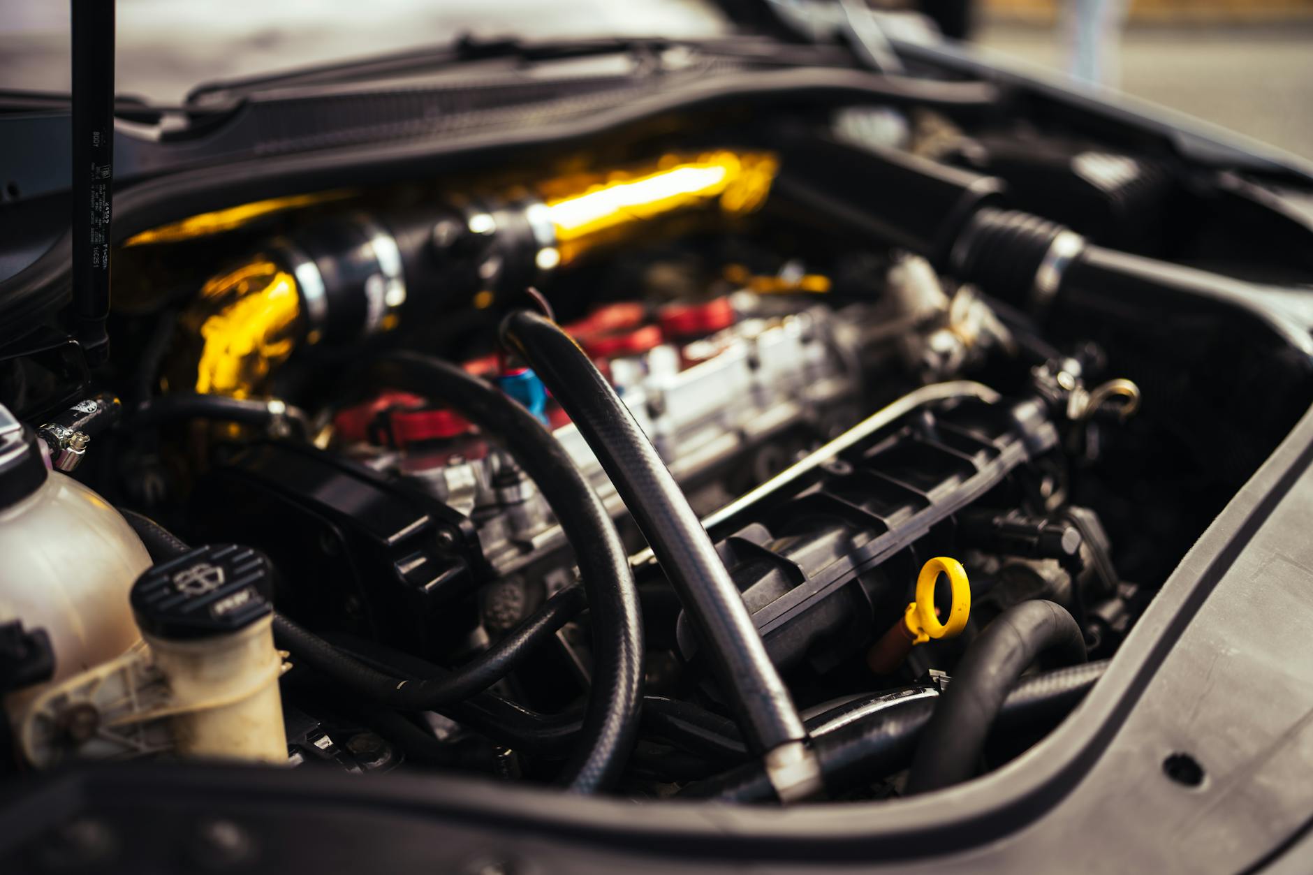 black and yellow car engine
