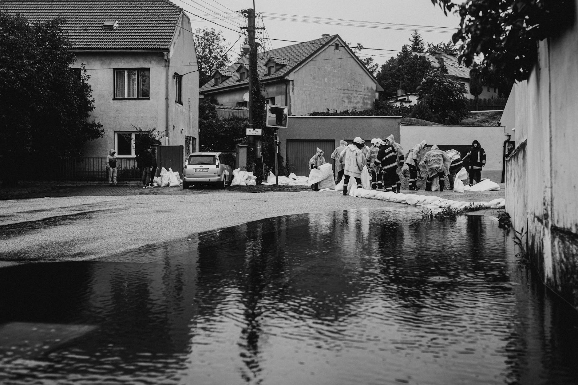 flood response team in residential street, Groundwater and Flood Control 