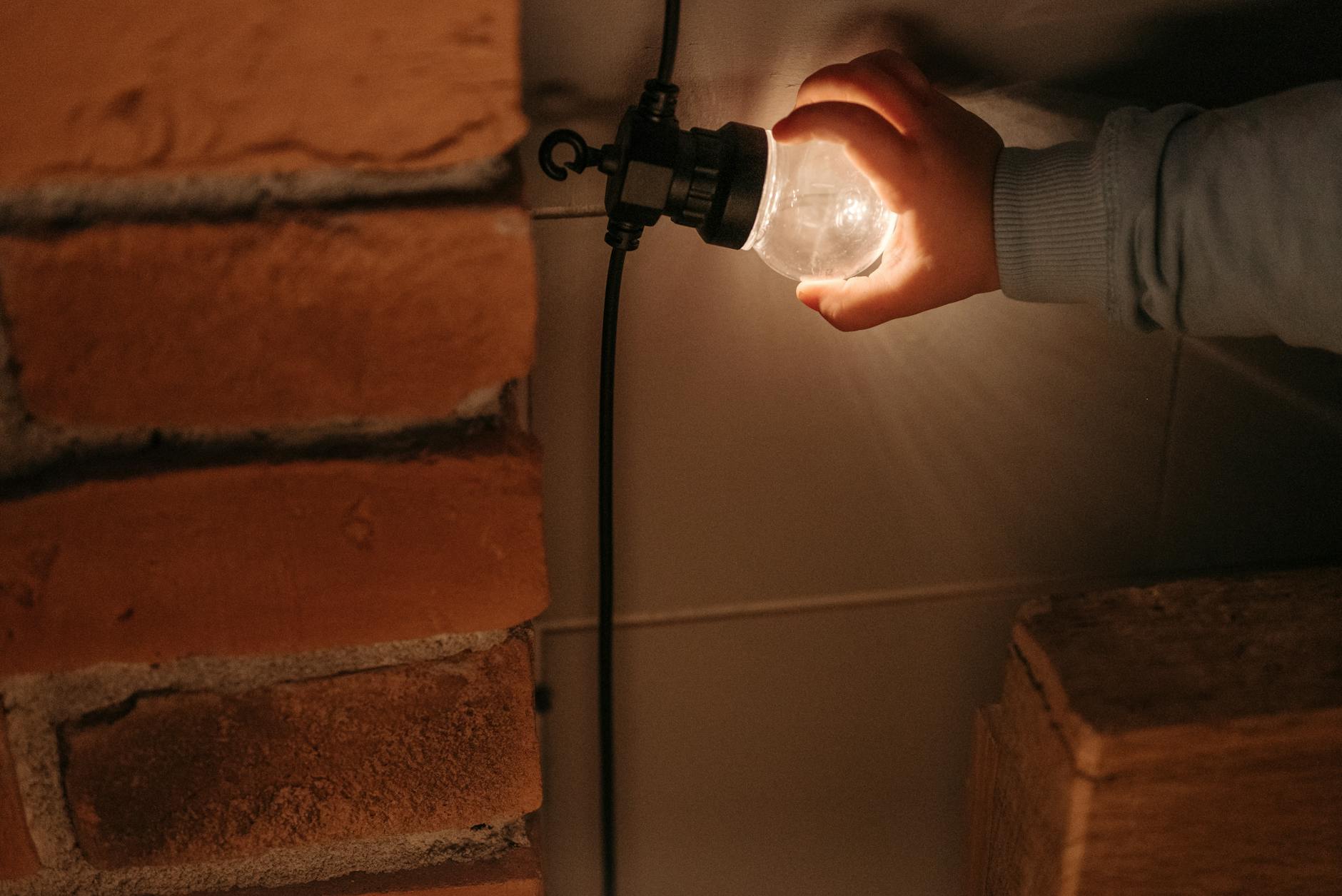 lighting bulb in hand