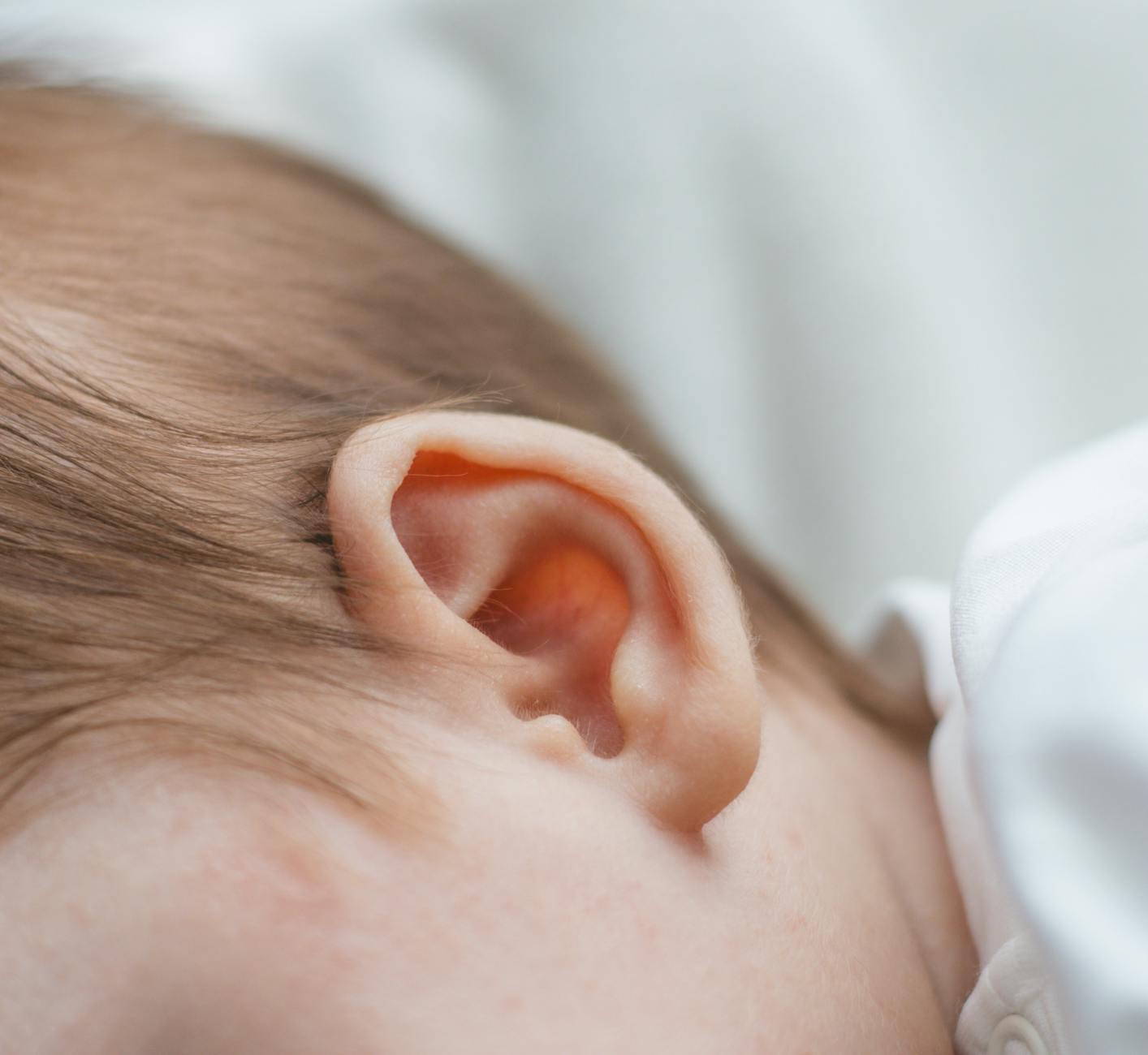 close up of a newborn baby s ear, Hearing Problems