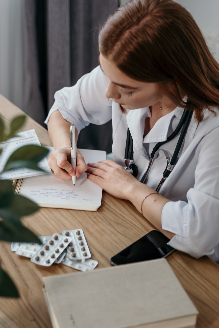 doctor writing a note