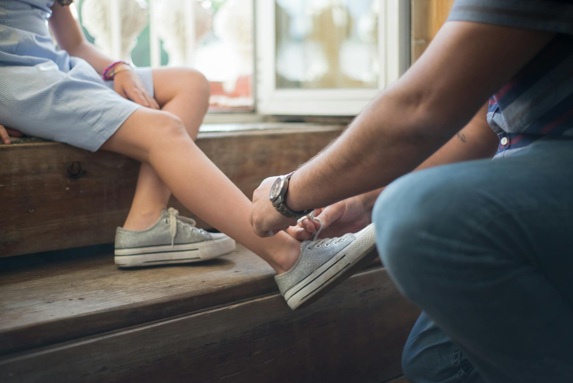 a father tying a shoe laces, Step Parenting and Blended Families 
