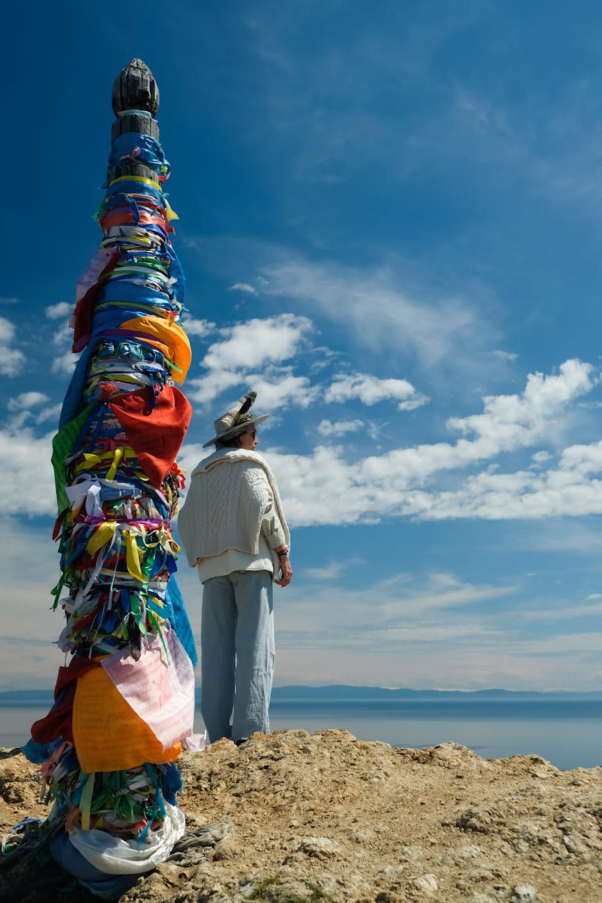 person standing on near sea