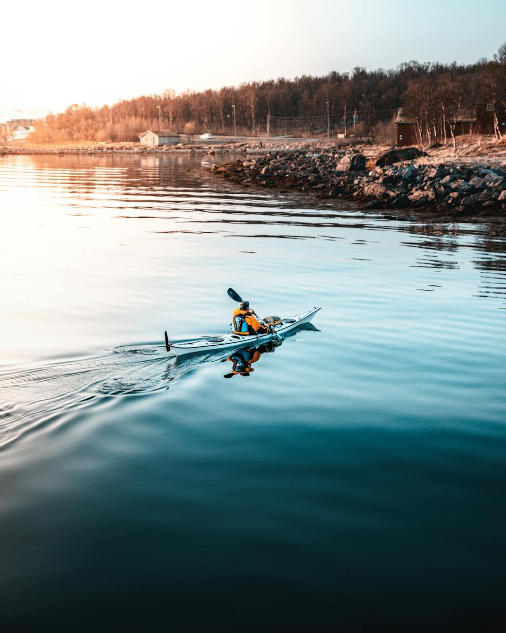 person riding on kayak