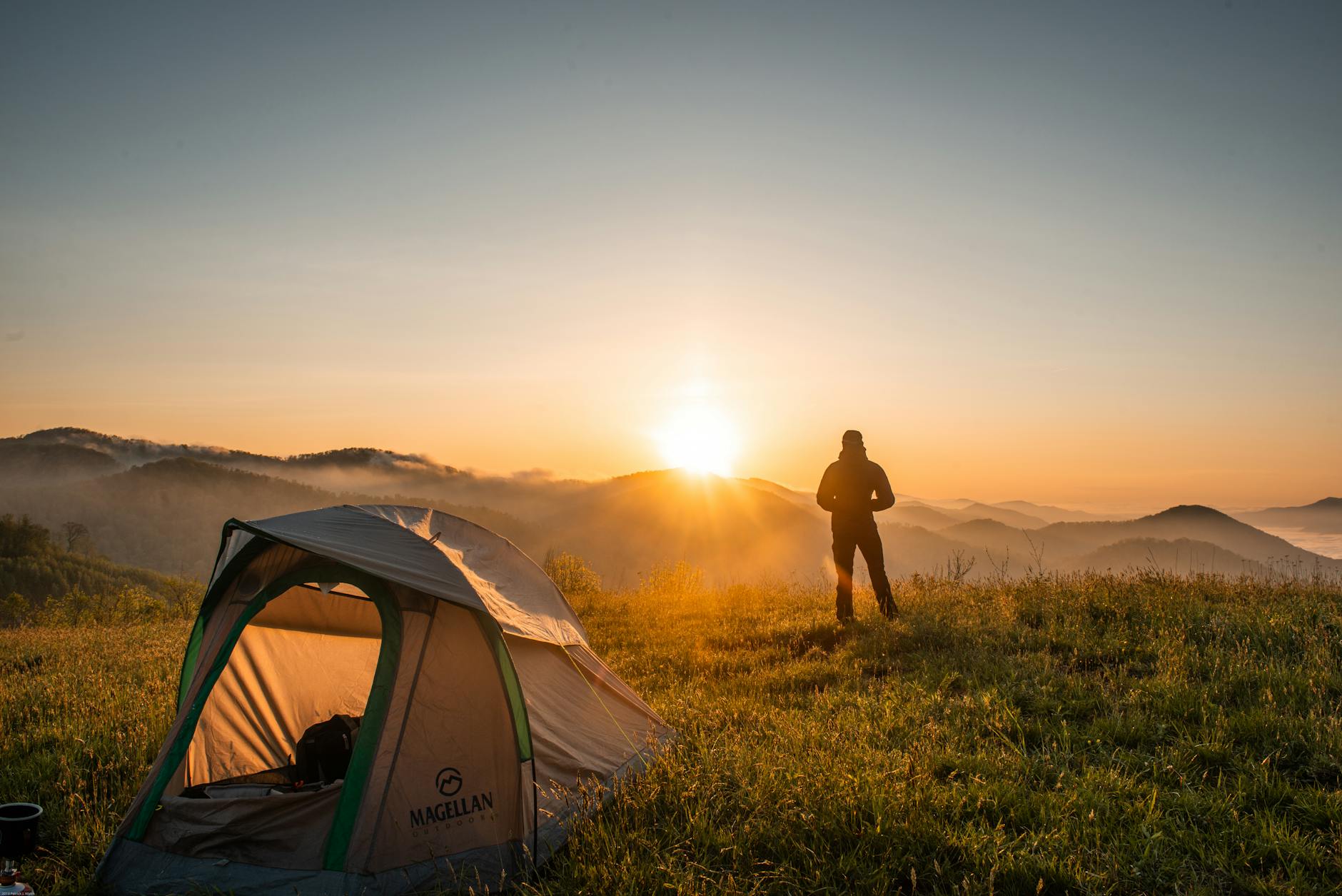 silhouette of person standing near camping tent, Hiking and Camping