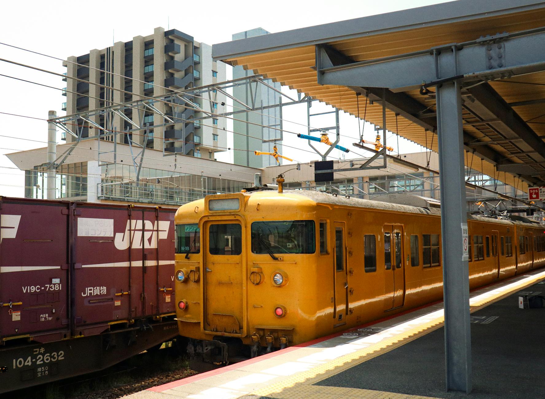 vintage yellow train at japanese station