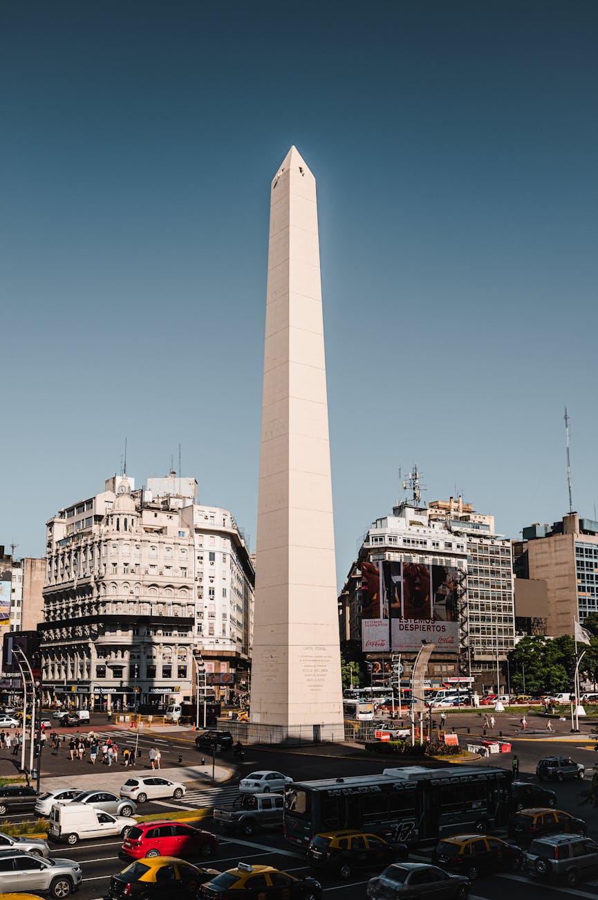 traffic by the obelisk of buenos aires monument