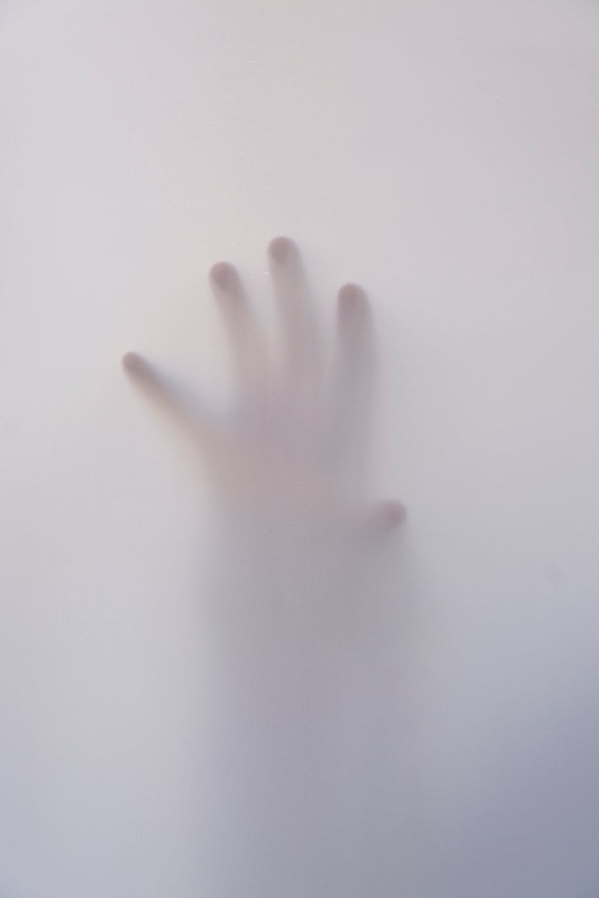 person s hand touching wall, Teen and Young Adult Paranormal Romance 