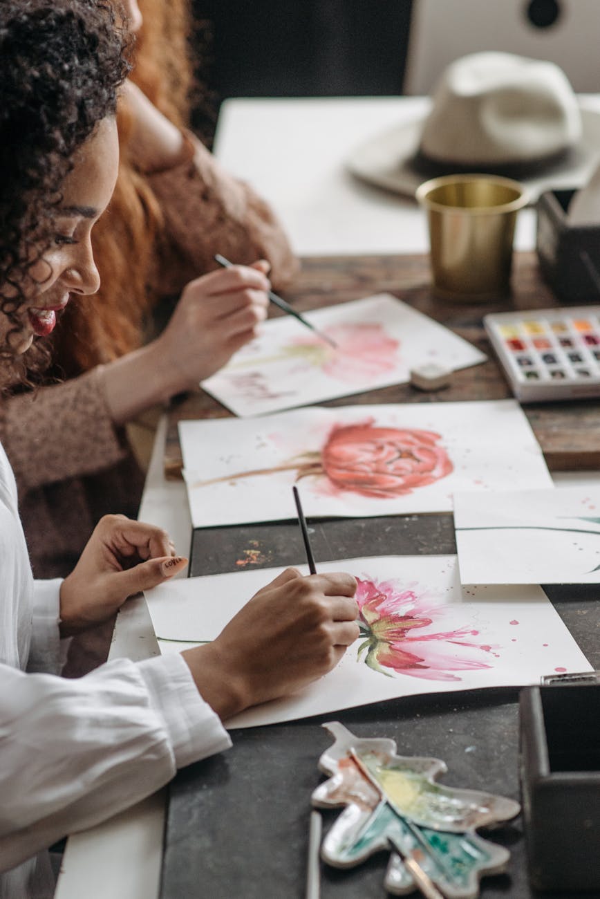 woman in white long sleeve shirt painting woman in pink and white floral, Teen and Young Adult Art Techniques