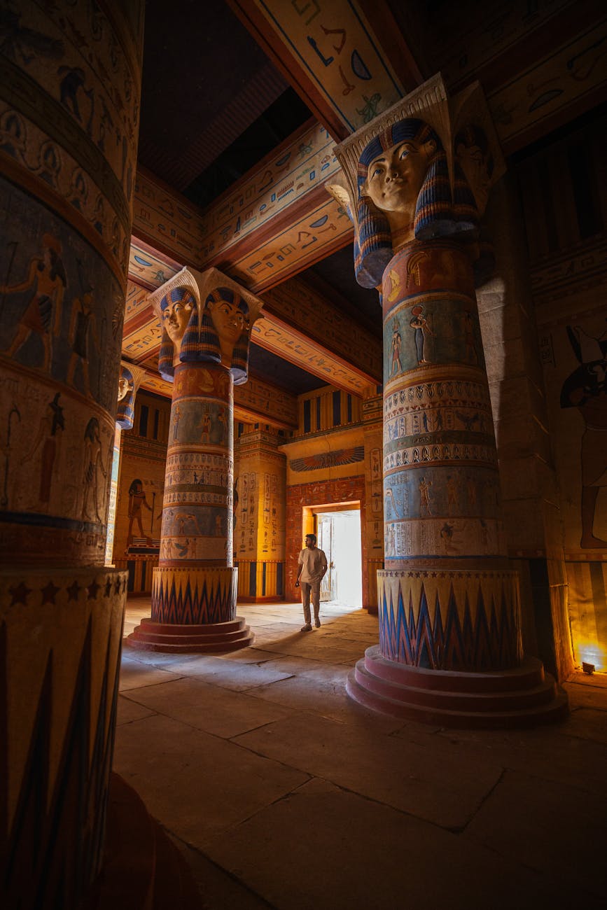man among columns at ancient temple, Archaeological Thriller 